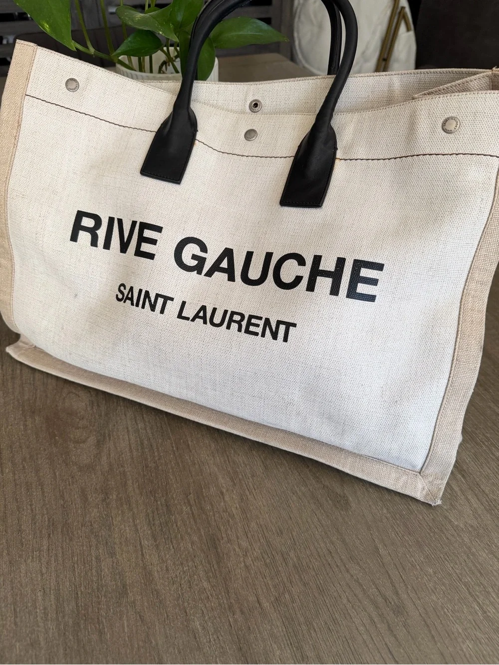 Saint Laurent taking receipt